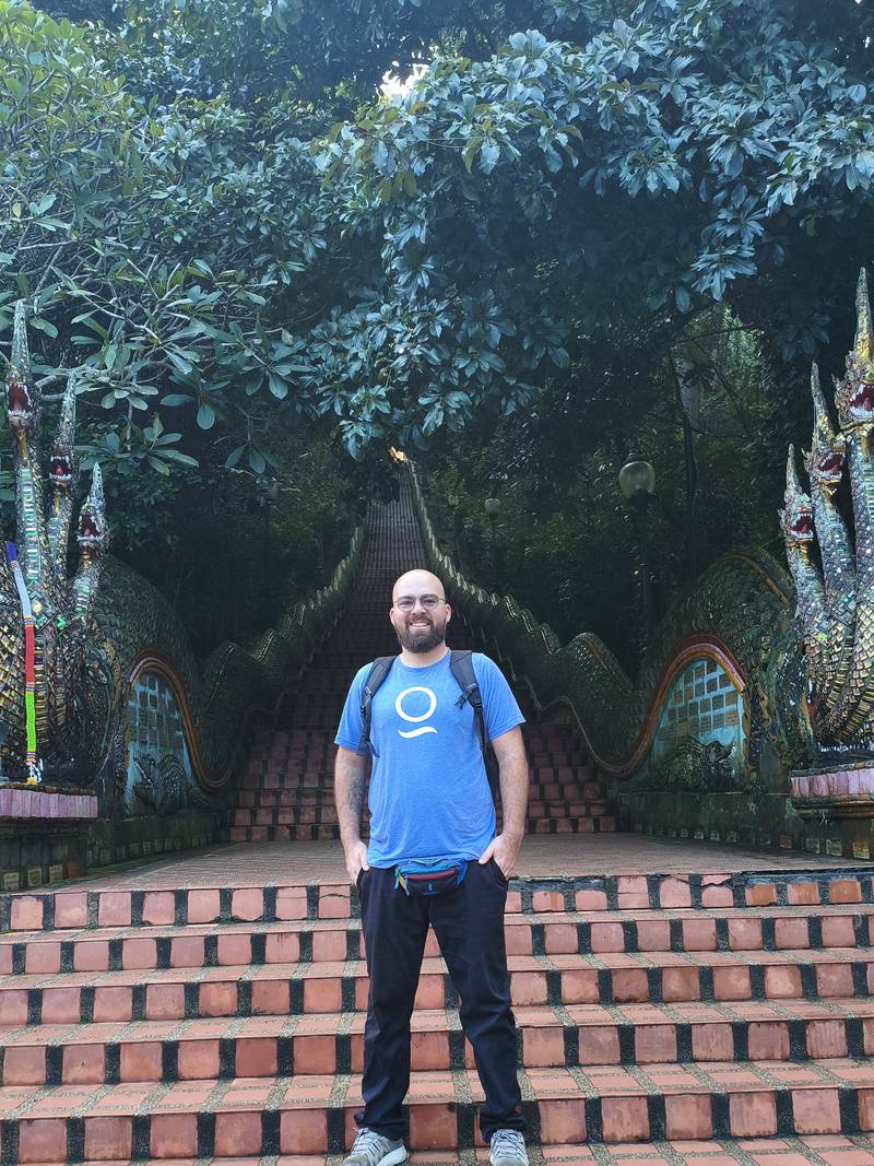 Teacher Reed on the naga staircase at a temple in Chiang Mai, Thailand